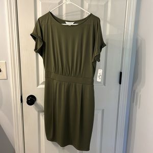 Brand new, never worn, dress. Short sleeves and short in length.